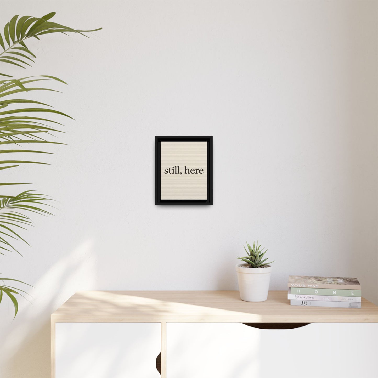 Framed Matte Canvas Wall Art — "still, here" Minimalist Typographic Print