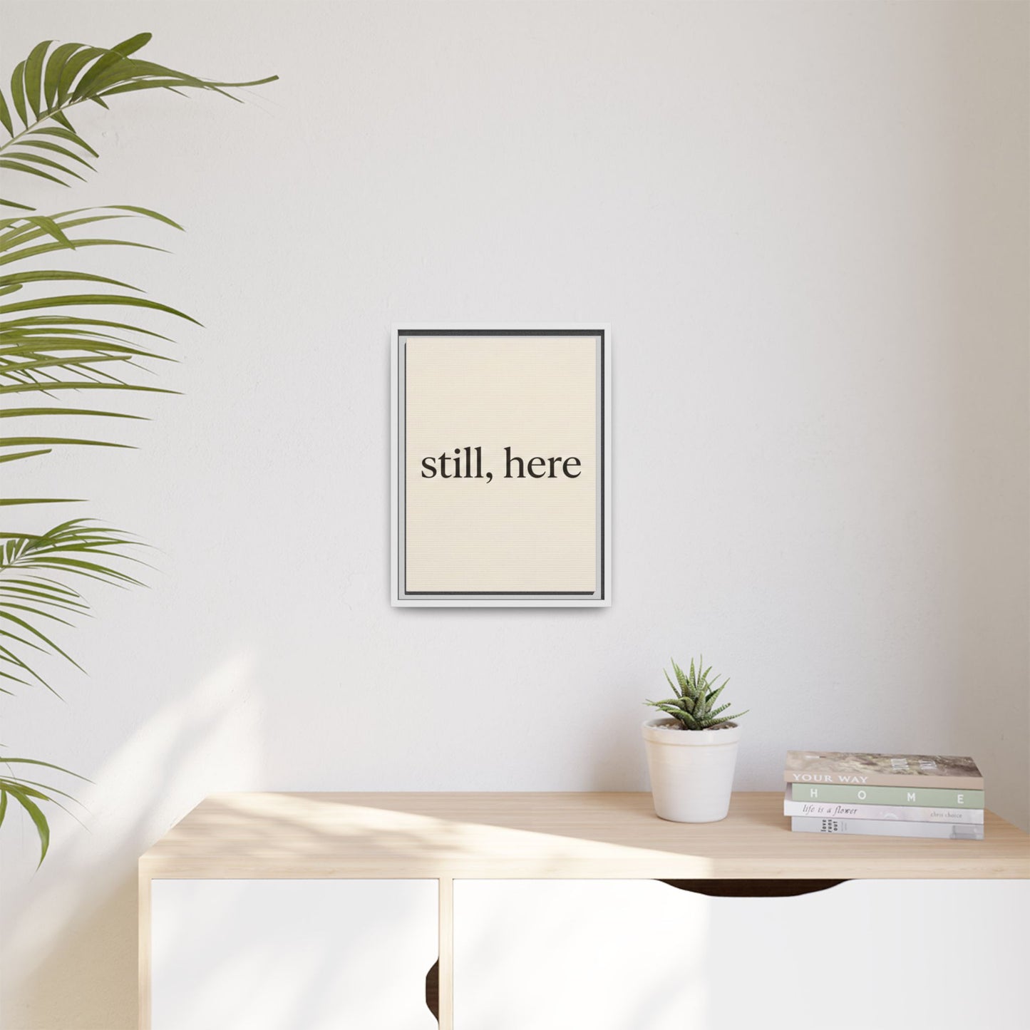 Framed Matte Canvas Wall Art — "still, here" Minimalist Typographic Print