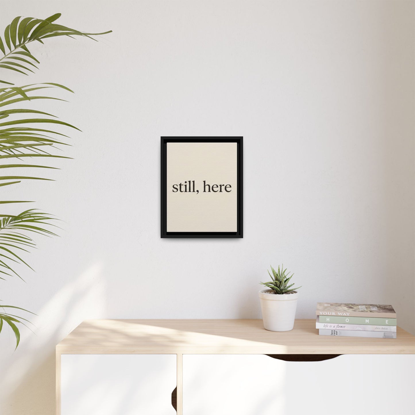 Framed Matte Canvas Wall Art — "still, here" Minimalist Typographic Print