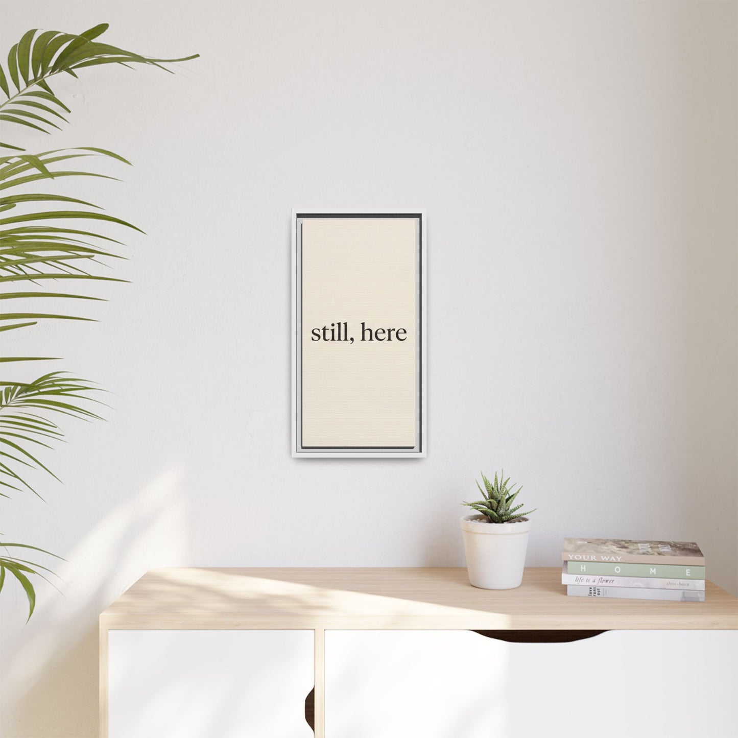 Framed Matte Canvas Wall Art — "still, here" Minimalist Typographic Print