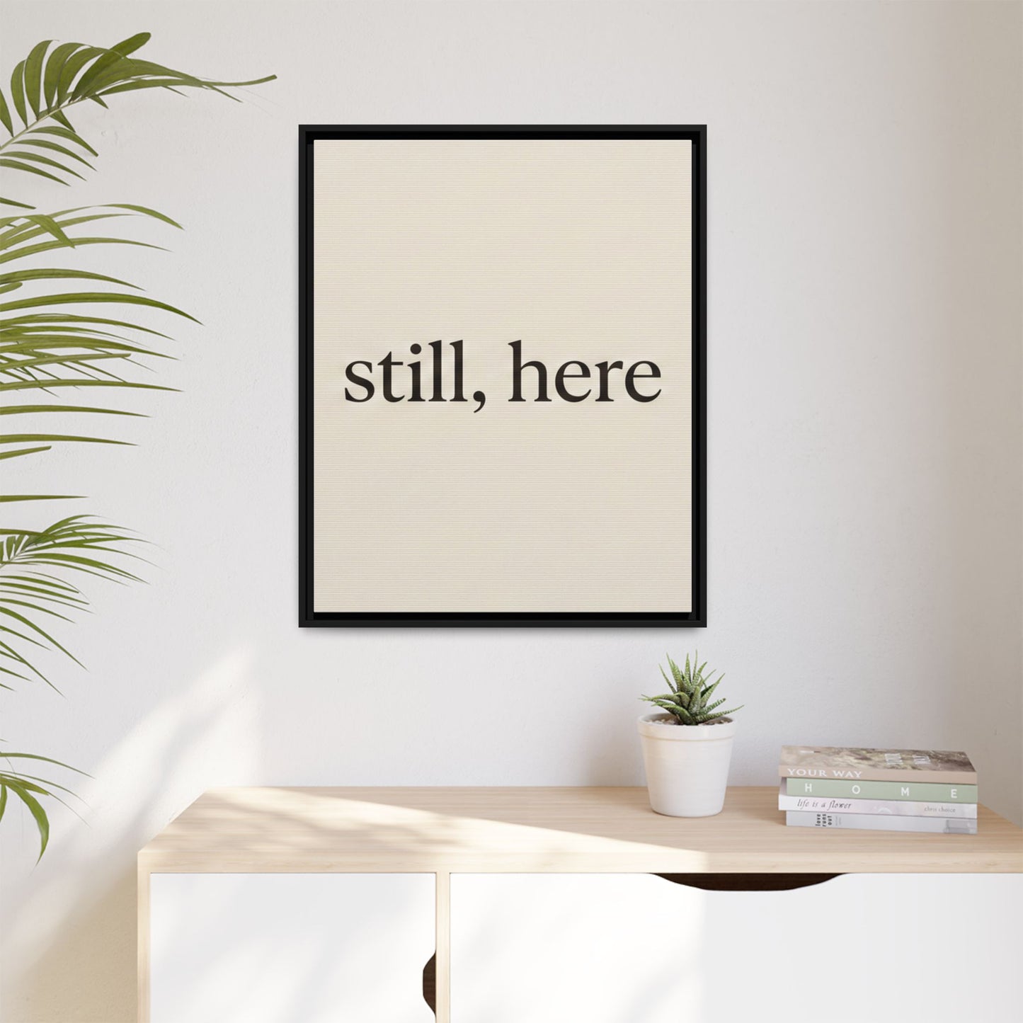Framed Matte Canvas Wall Art — "still, here" Minimalist Typographic Print