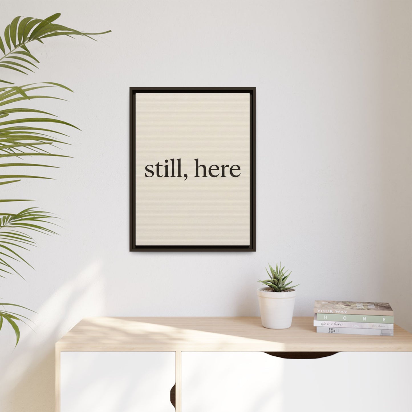 Framed Matte Canvas Wall Art — "still, here" Minimalist Typographic Print