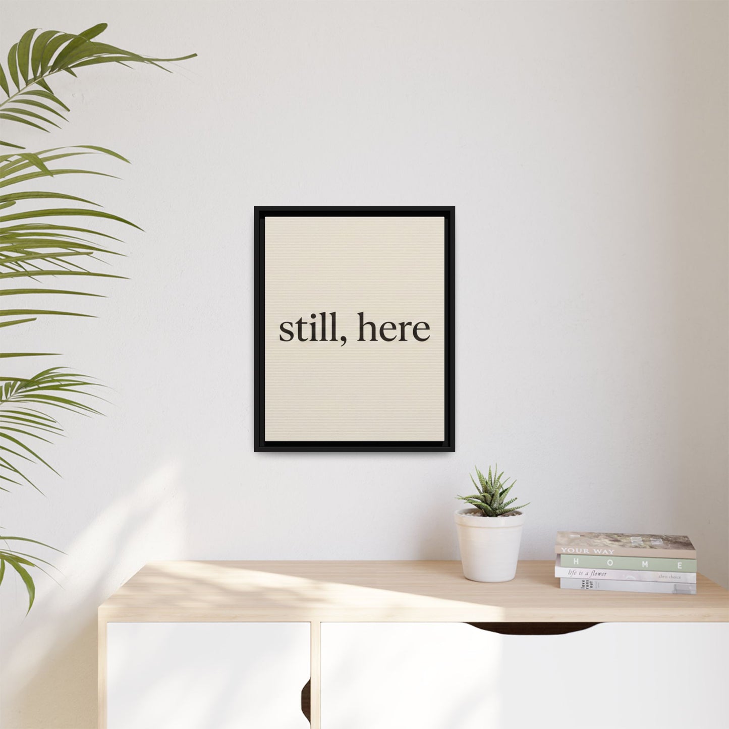 Framed Matte Canvas Wall Art — "still, here" Minimalist Typographic Print