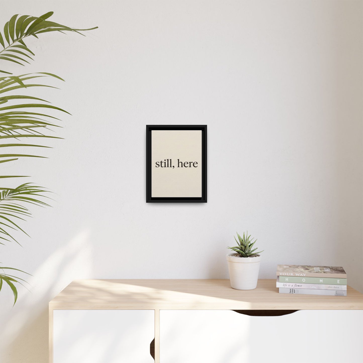Framed Matte Canvas Wall Art — "still, here" Minimalist Typographic Print