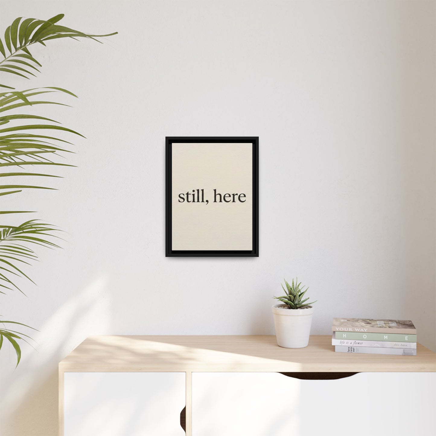 Framed Matte Canvas Wall Art — "still, here" Minimalist Typographic Print