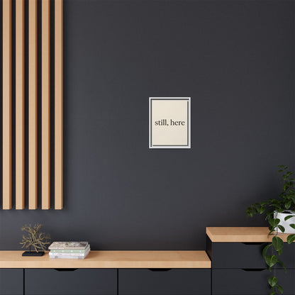 Framed Matte Canvas Wall Art — "still, here" Minimalist Typographic Print