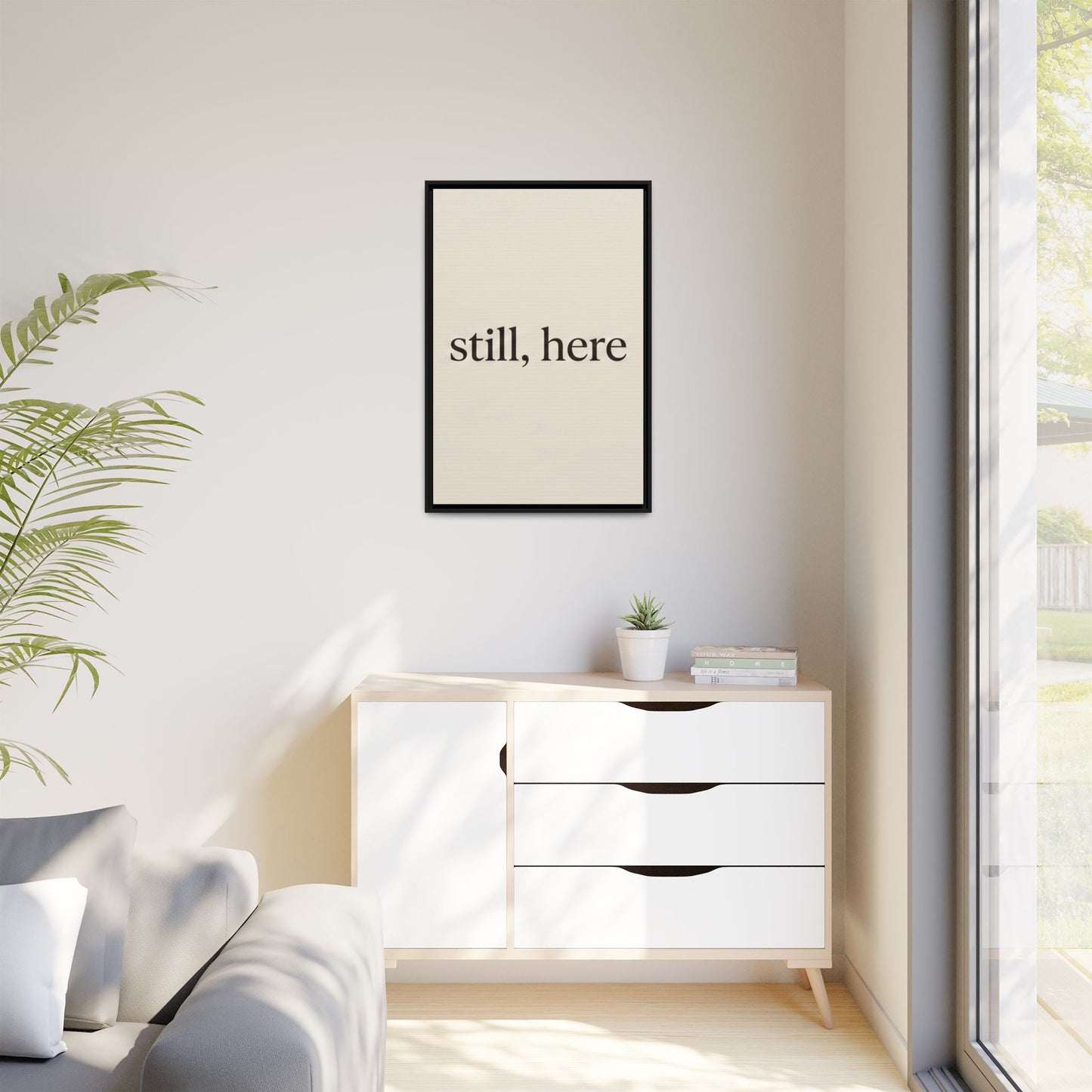 Framed Matte Canvas Wall Art — "still, here" Minimalist Typographic Print