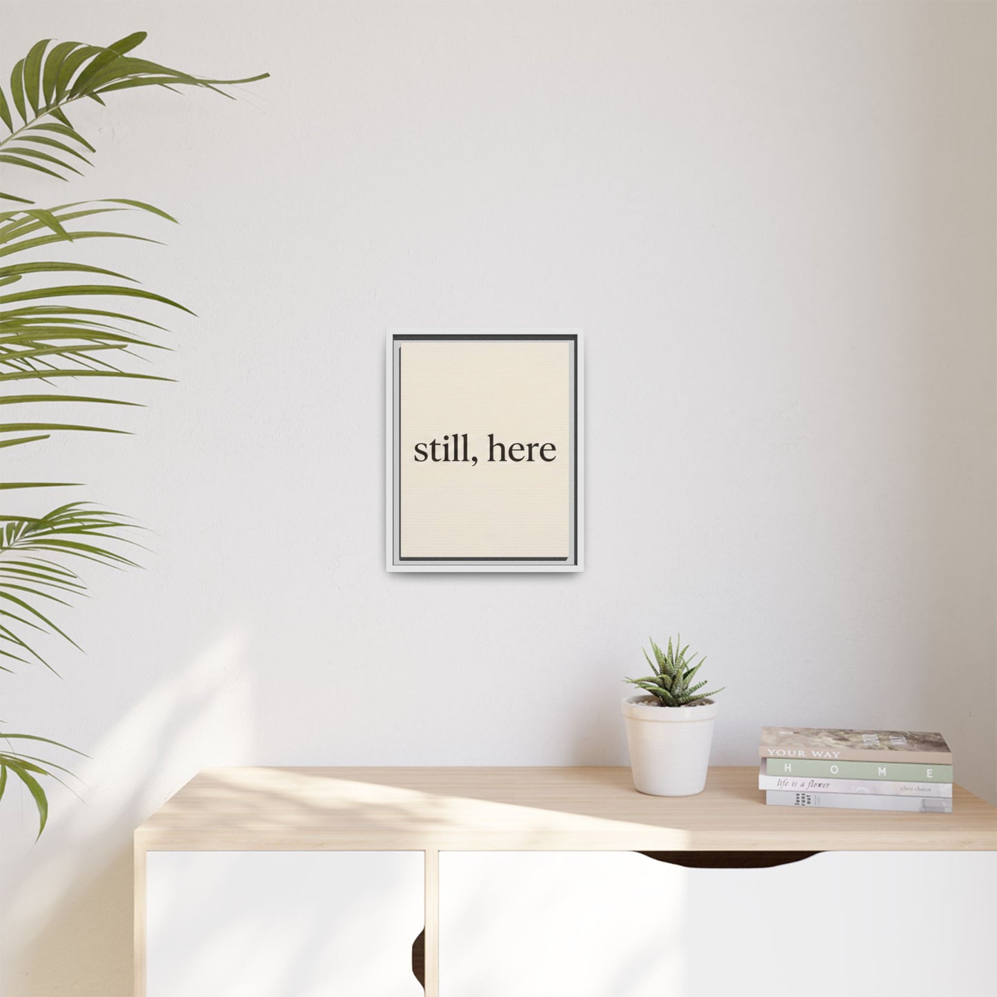 Framed Matte Canvas Wall Art — "still, here" Minimalist Typographic Print