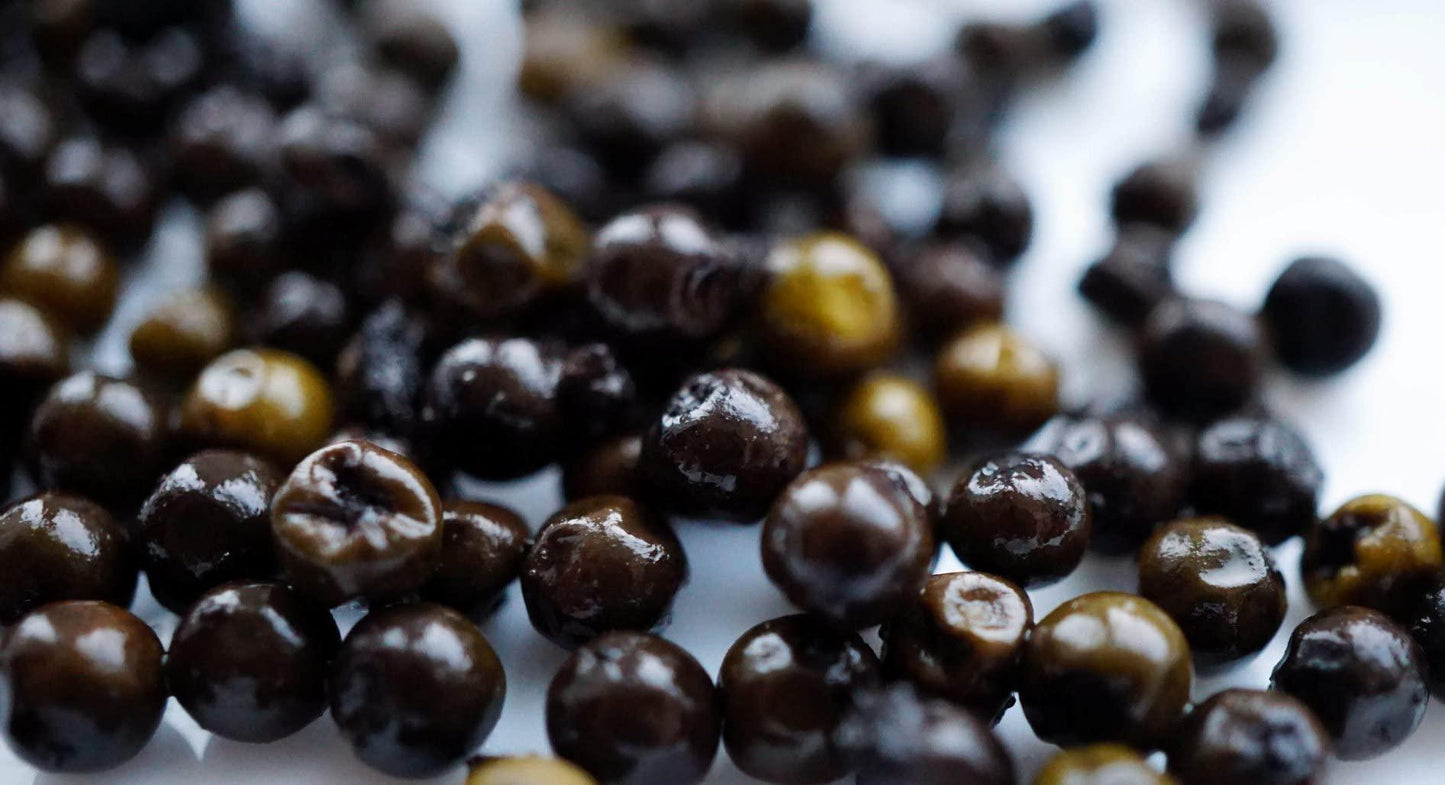 Kampot pepper (piper nigrum) from our own farm in Cambodia in a vacuum bag box