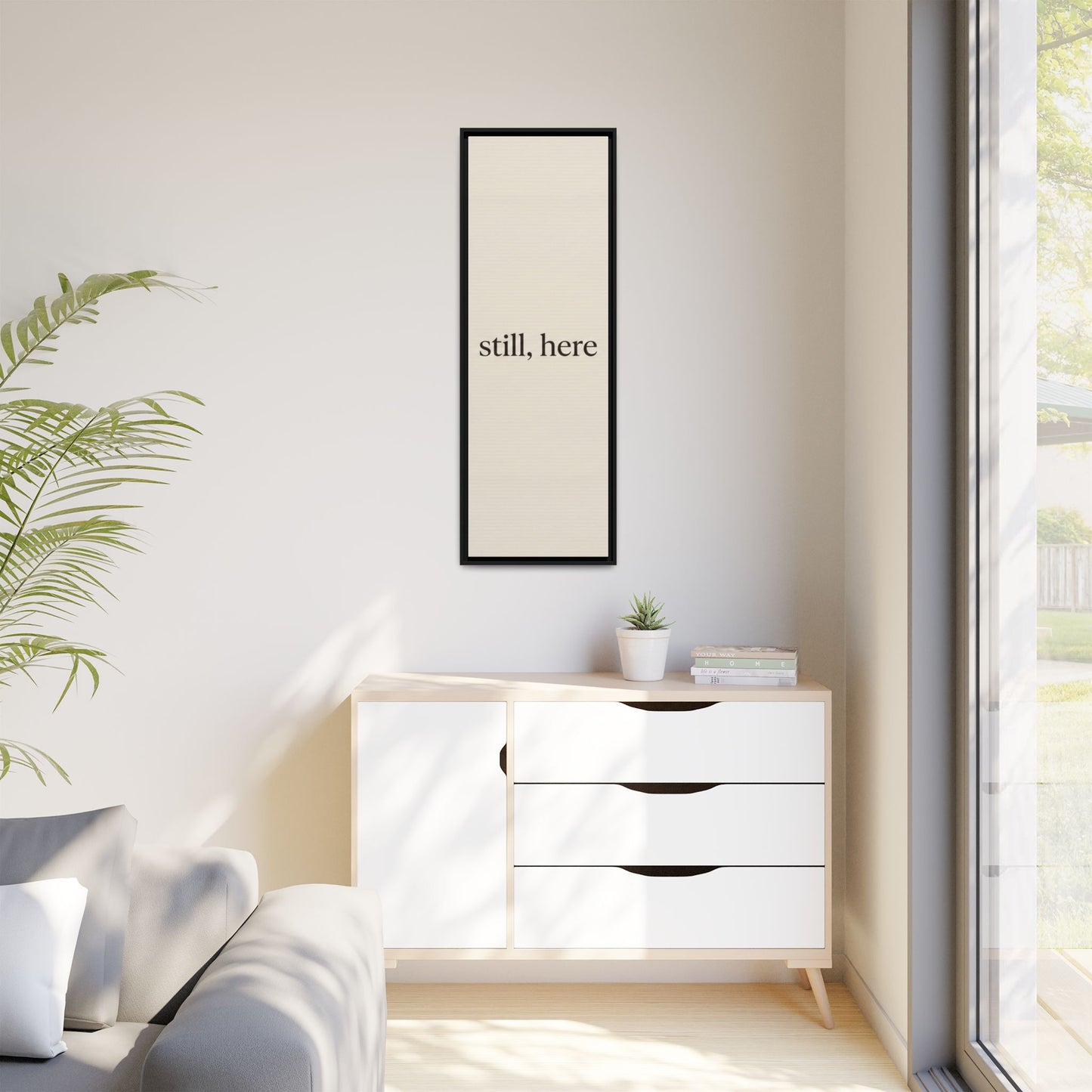 Framed Matte Canvas Wall Art — "still, here" Minimalist Typographic Print