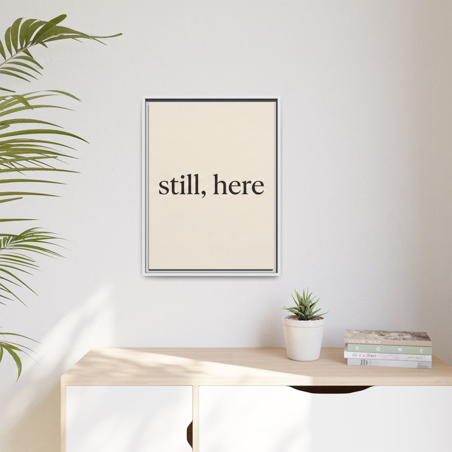 Framed Matte Canvas Wall Art — "still, here" Minimalist Typographic Print