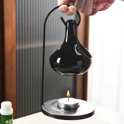 Hanging Pagan Cauldron Oil Burner, Black Wax Warmer Aroma Diffuser, with Handle, for Essential Fragrance Wax Melts, Enchanting Witches' Home Decor Element.