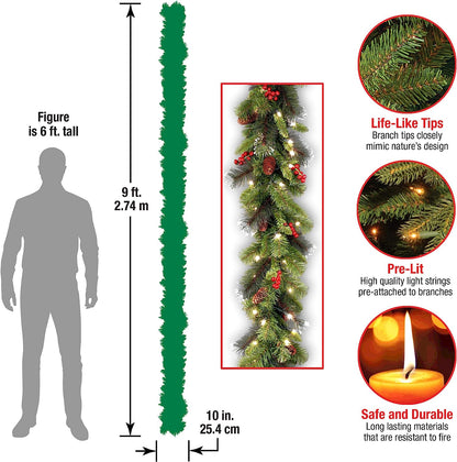 Pre-Lit Artificial Christmas Garland, Green, Crestwood Spruce, White Lights, Decorated with Pine Cones, Berry Clusters, Plug In, Christmas Collection, 9 Feet